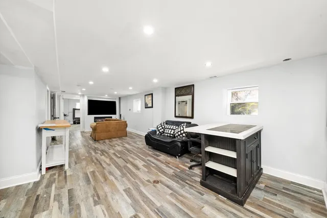 a living room with furniture and a table