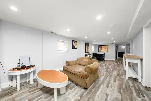 a bathroom with a sink a toilet and a shower