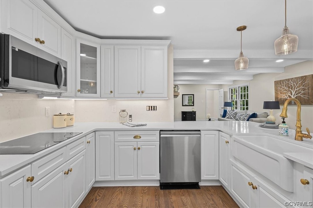 9349 Cardiff Loop Road North Chesterfield, VA 23236 - Photo 19 of 50 a kitchen with white cabinets stainless steel appliances and sink