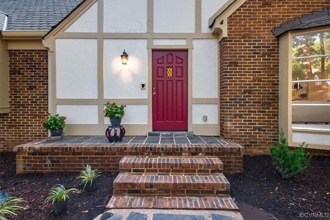 9349 Cardiff Loop Road North Chesterfield, VA 23236 - Photo 2 of 50 a view of front door and potted plants