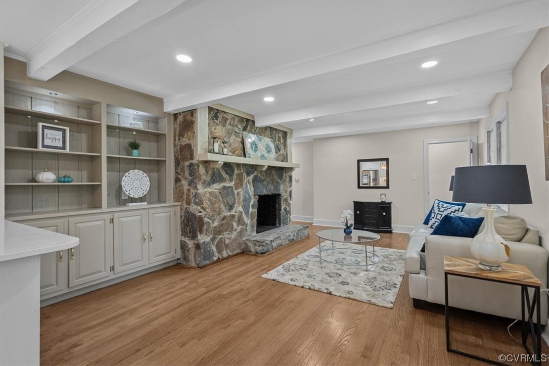 9349 Cardiff Loop Road North Chesterfield, VA 23236 - Photo 22 of 50 a living room with furniture and a fireplace