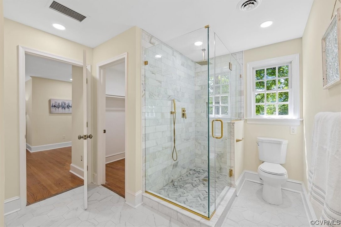 9349 Cardiff Loop Road North Chesterfield, VA 23236 - Photo 29 of 50 a bathroom with a shower a toilet and a sink