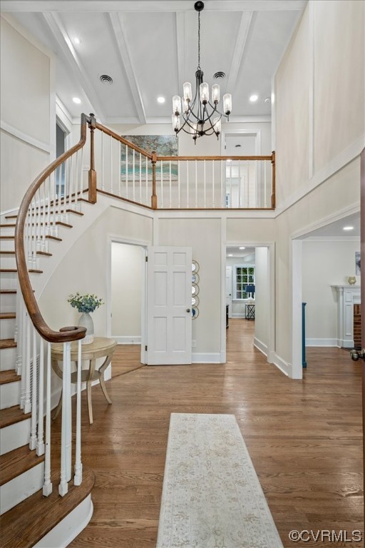 9349 Cardiff Loop Road North Chesterfield, VA 23236 - Photo 3 of 50 a view of an entryway with wooden floor and chandelier