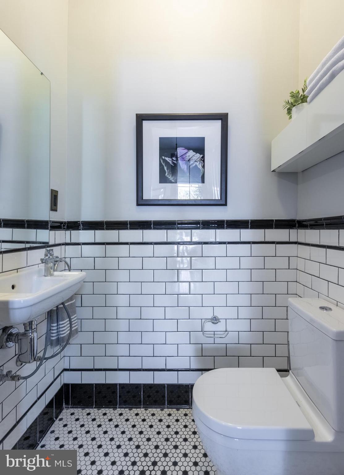 1239 Perry Street Northeast Washington, DC 20017 - Photo 12 of 36 Beautifully tiled half bath