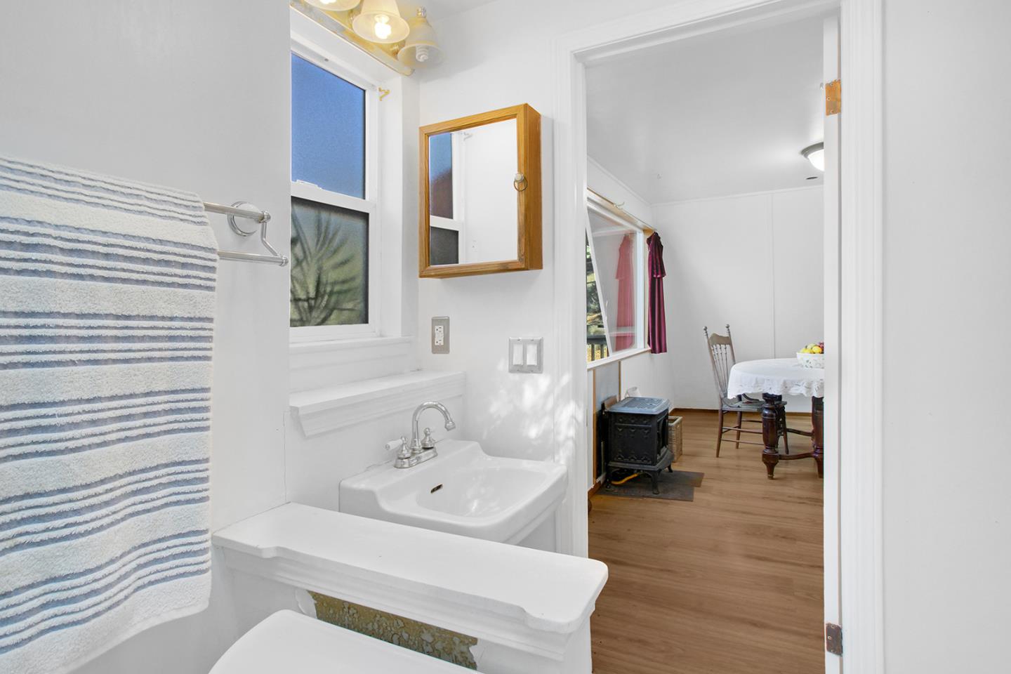 176 Roquena Drive La Honda, CA 94020 - Photo 11 of 21 a bathroom with a bathtub sink and mirror