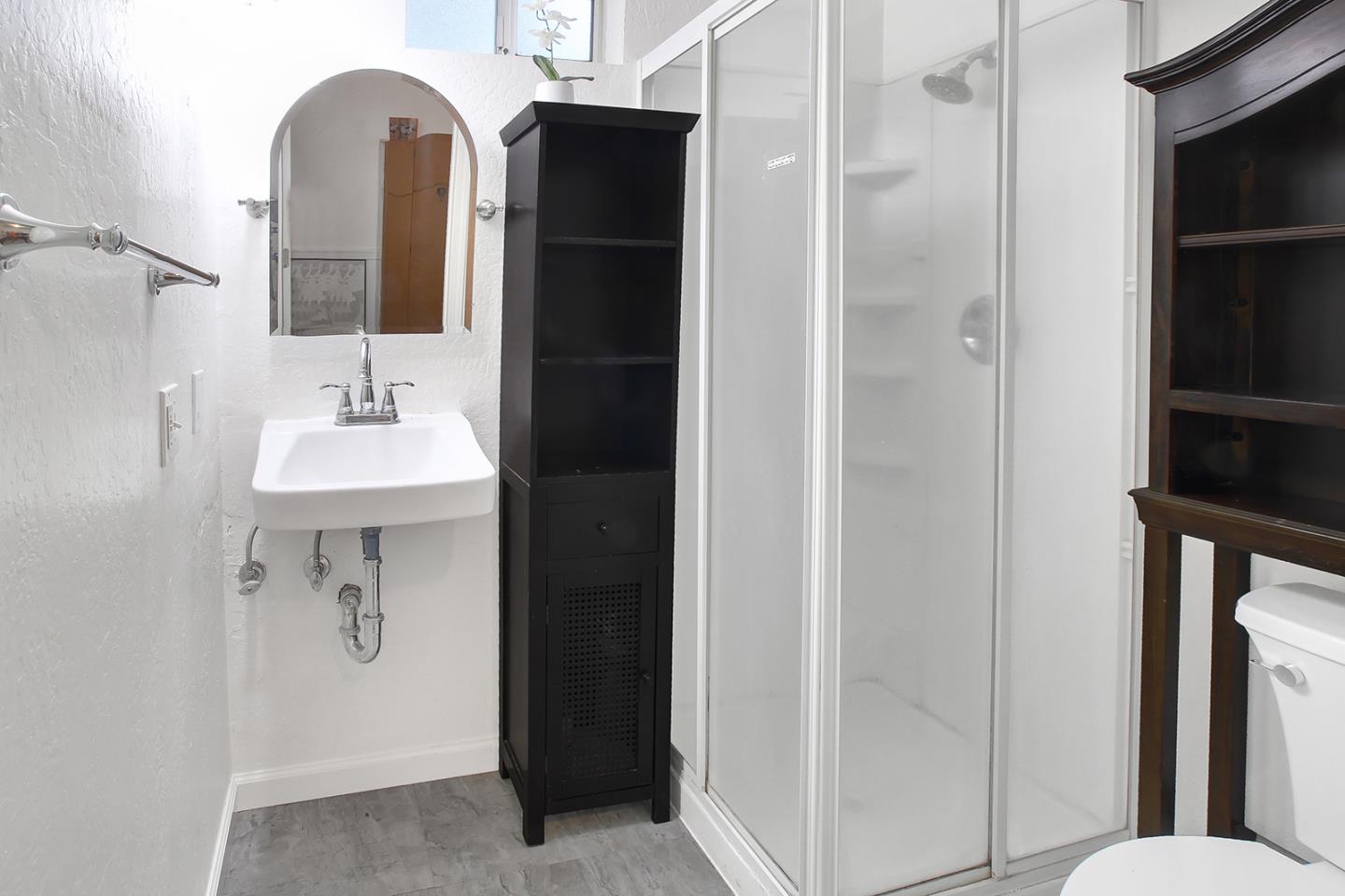 176 Roquena Drive La Honda, CA 94020 - Photo 15 of 21 a bathroom with a sink and mirror