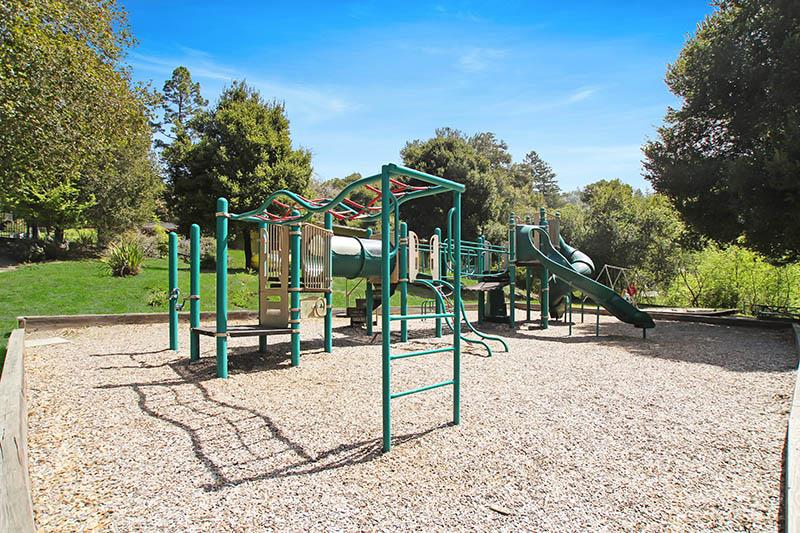176 Roquena Drive La Honda, CA 94020 - Photo 20 of 21 a view of a park with swings and slides