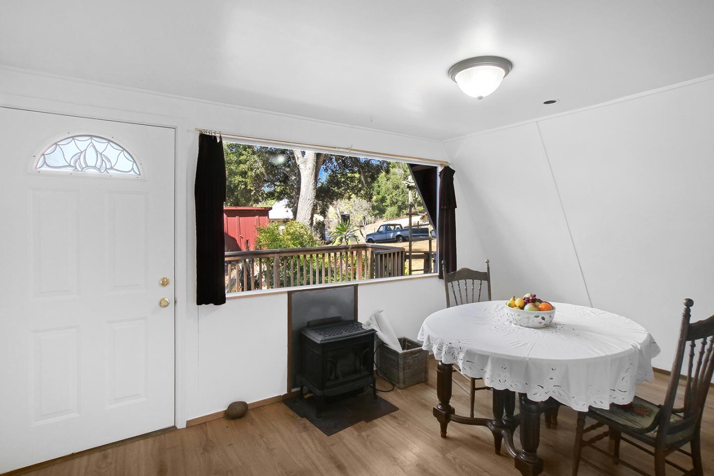 176 Roquena Drive La Honda, CA 94020 - Photo 6 of 21 a view of a dining room with furniture window and outside view