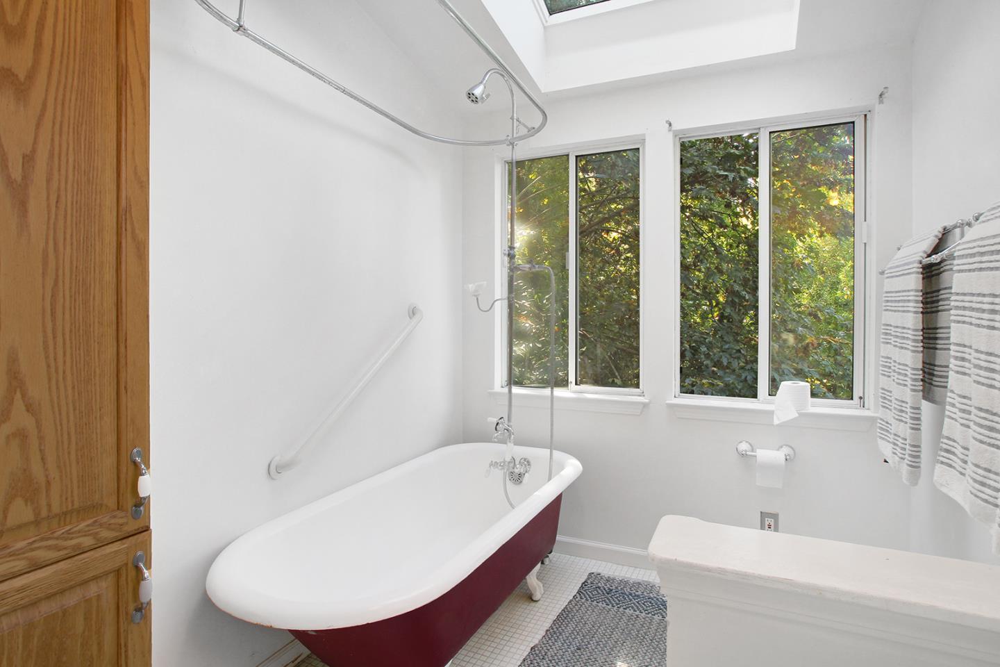 176 Roquena Drive La Honda, CA 94020 - Photo 10 of 21 a bathroom with a white tub shower and sink