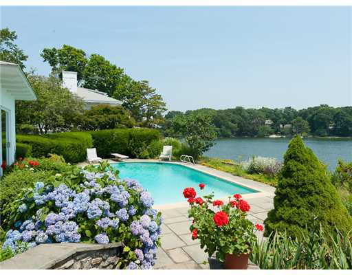 a view of lake with outdoor seating
