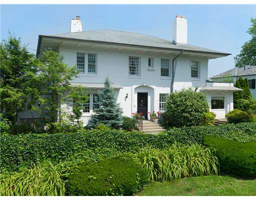 701 Steamboat Road Greenwich, CT 06830 - Photo 5 of 19 a front view of a house with a yard