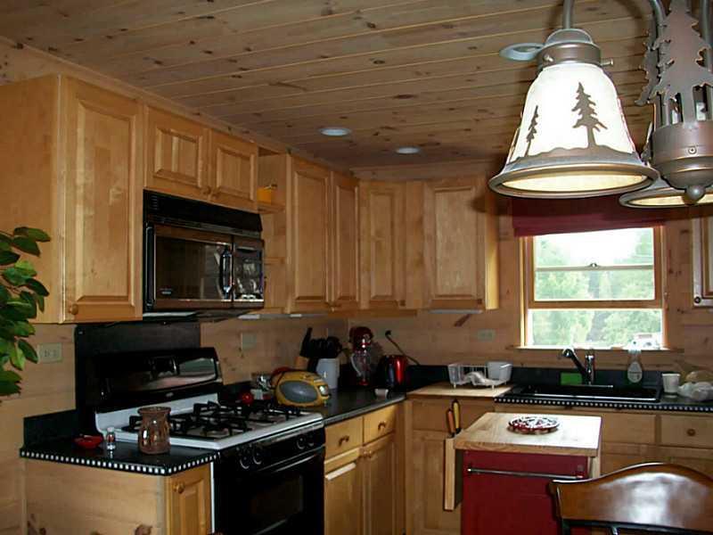 44 Stratton Road Rangeley, ME 04970 - Photo 6 of 33 Kitchen. Cottage kitchen with...