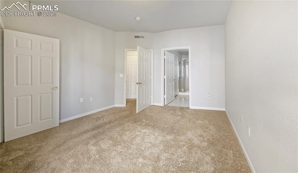 3731 Riviera Grove, Unit 104 Colorado Springs, CO 80922 - Photo 6 of 15 a view of an empty room