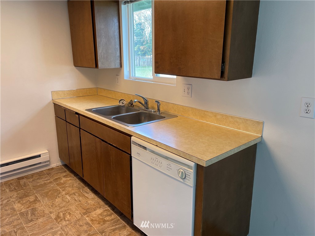 18404 Albany Street Southwest, Unit A & D Rochester, WA 98579 - Photo 19 of 19 a utility room with sink and mirror