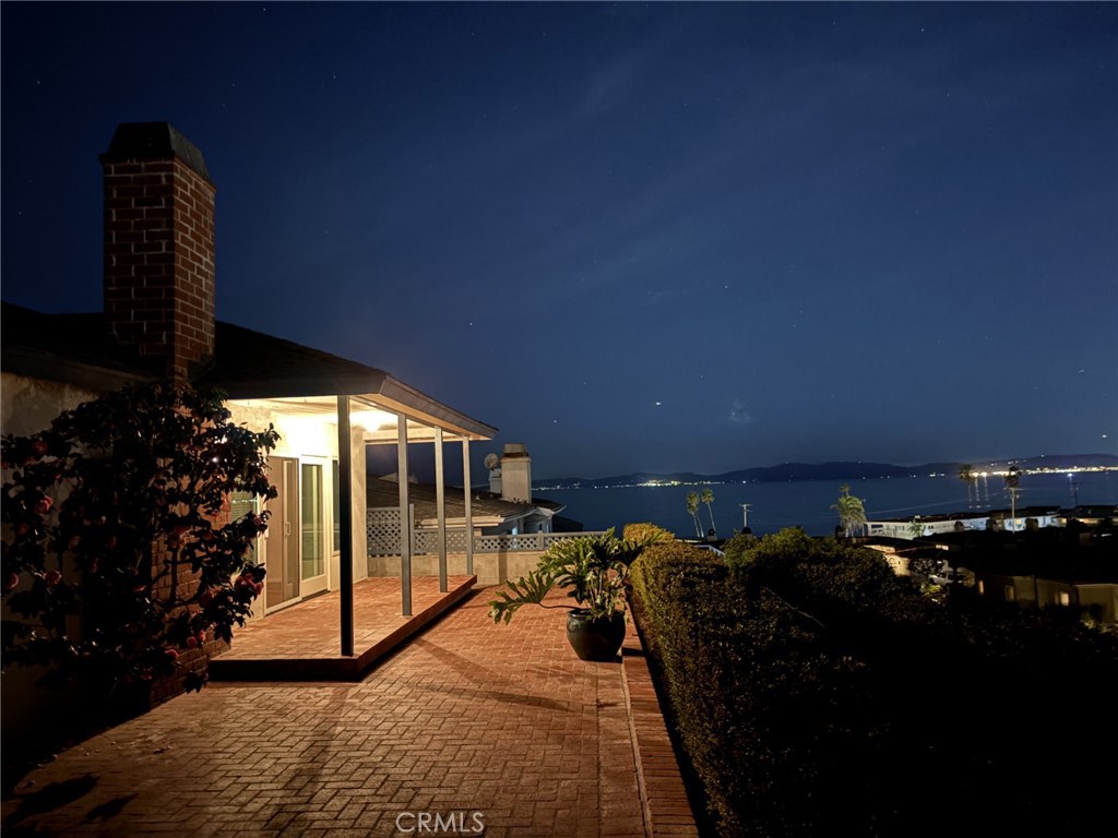 205 Pso De Suenos Redondo Beach, CA 90277 - Photo 3 of 34 a view of a balcony with many windows
