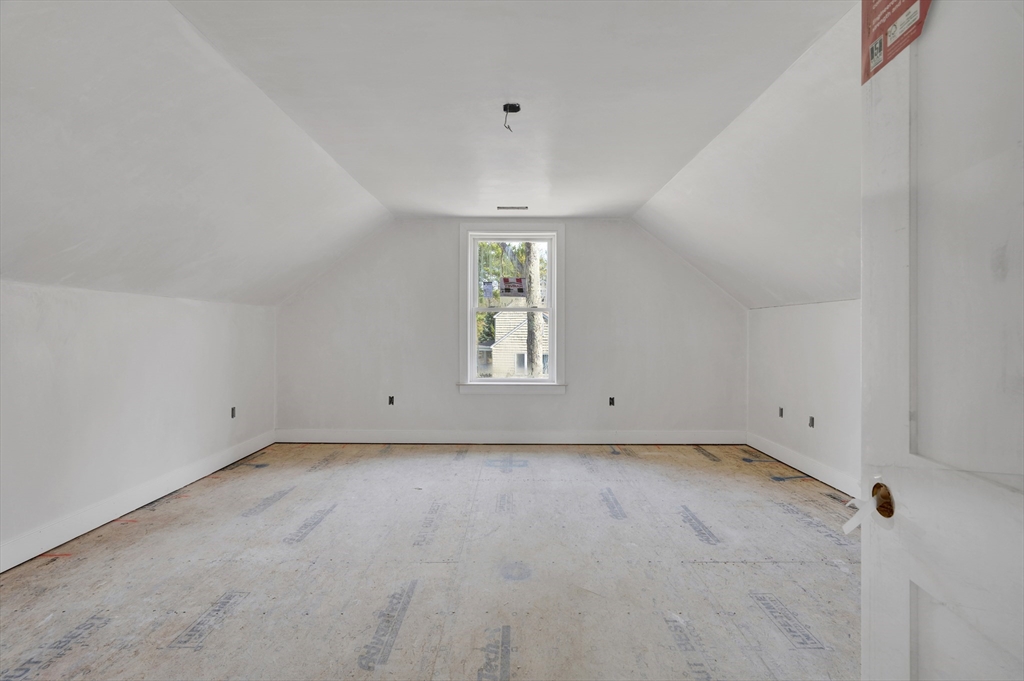 18 MacDonald Drive Boxford, MA 01921 - Photo 35 of 38 wooden floor in an empty room with a window