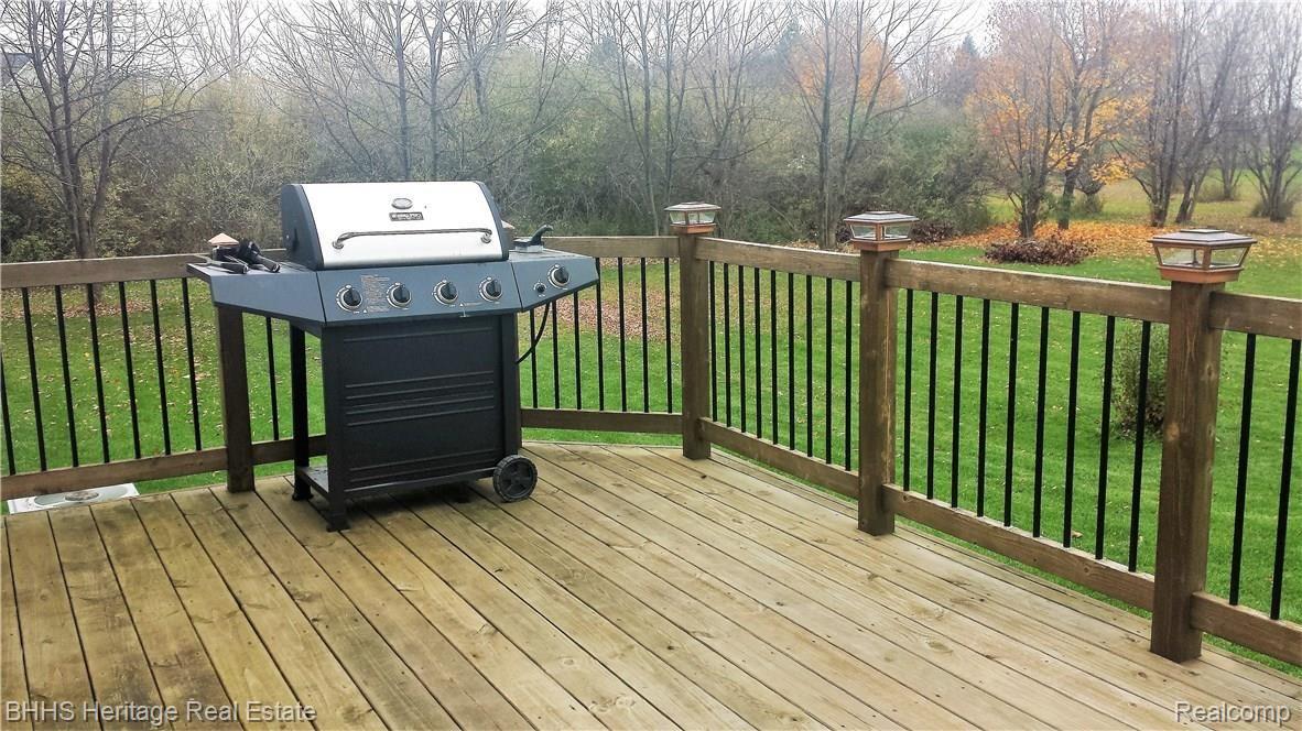 908 Chase Lake Road Howell, MI 48855 - Photo 8 of 34 deck 2.jpg