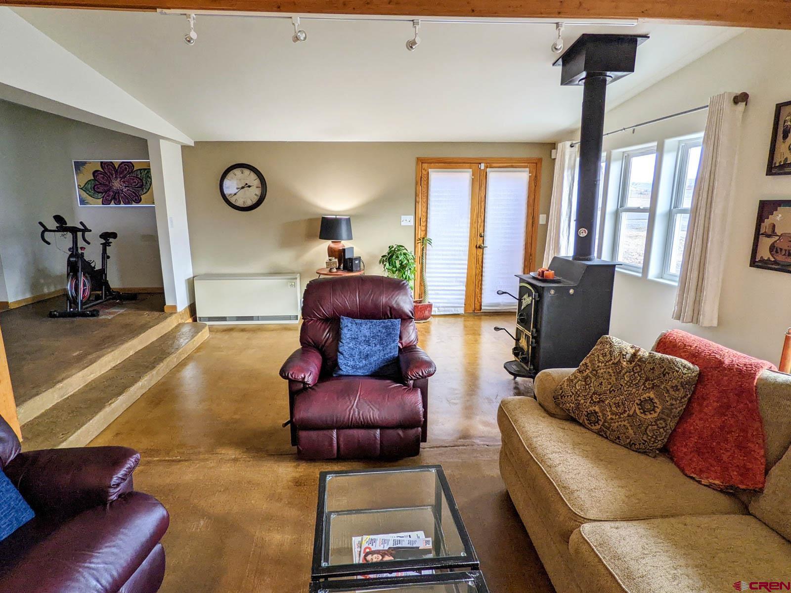 6733 2050th Road Delta, CO 81416 - Photo 3 of 32 a living room with furniture and a large window