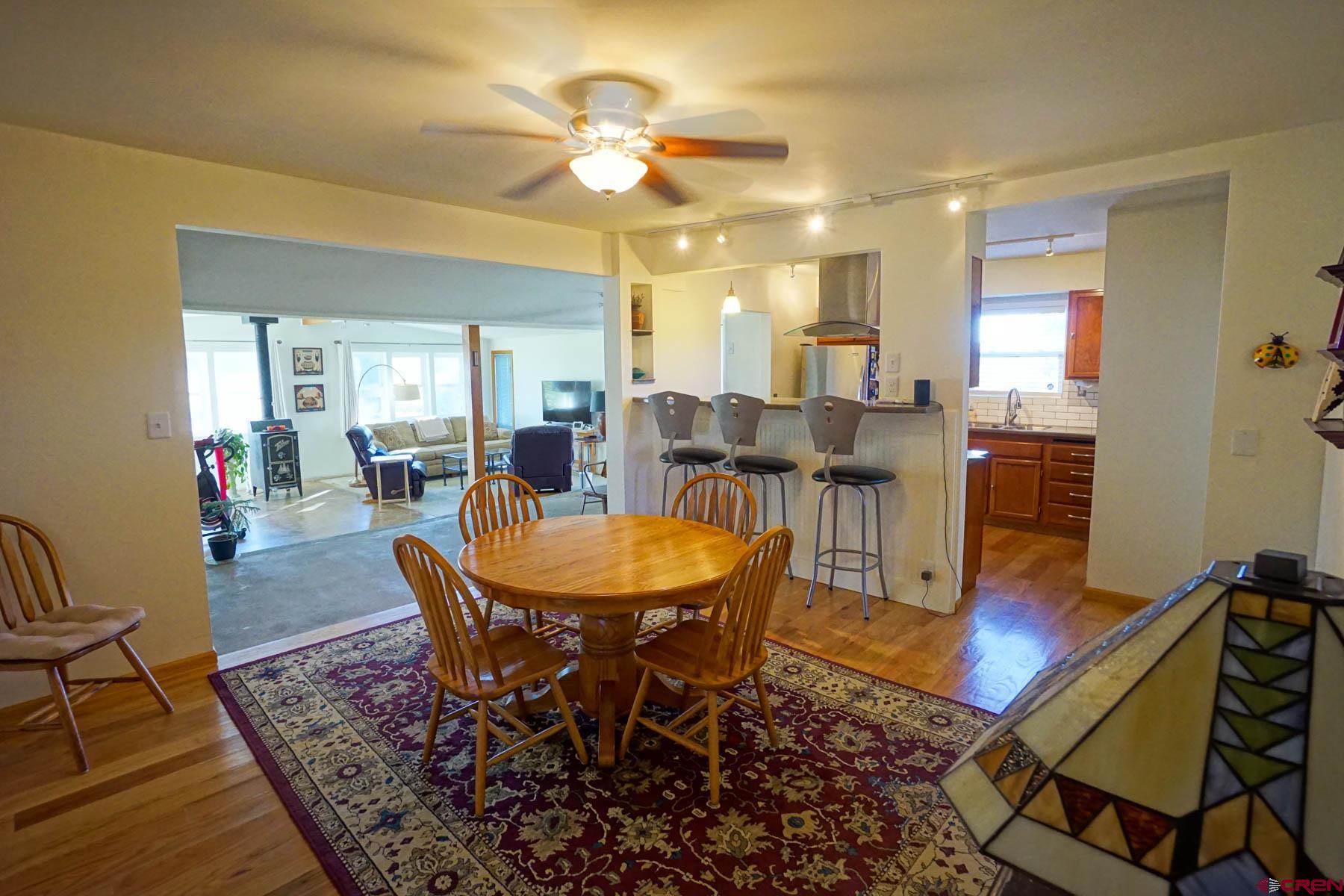 6733 2050th Road Delta, CO 81416 - Photo 5 of 32 a view of a dining room with furniture