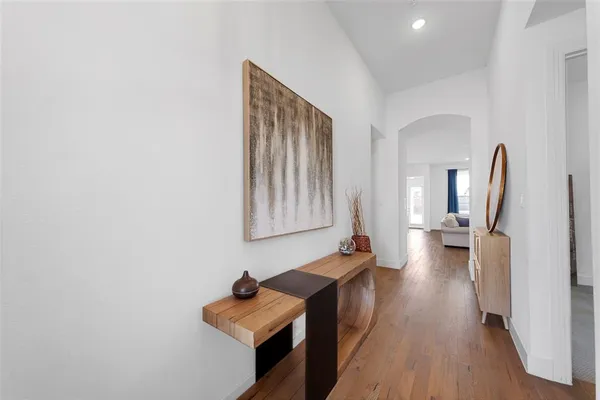 a view of a entryway with wooden floor