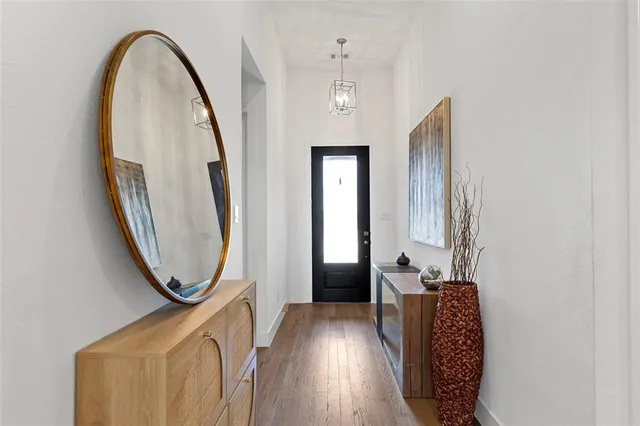 a living room with fireplace furniture and a flat screen tv