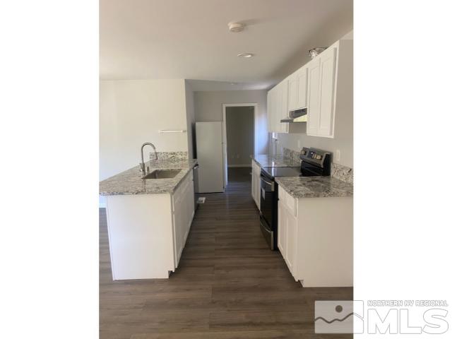 640 Morrill Avenue Reno, NV 89512 - Photo 6 of 15 a kitchen with sink and refrigerator