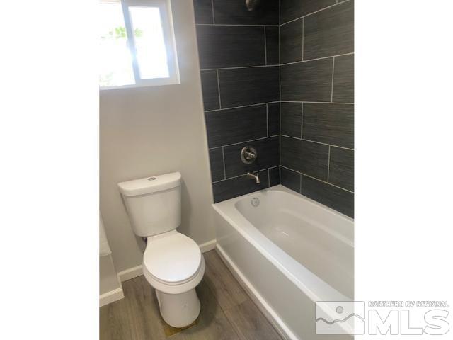 640 Morrill Avenue Reno, NV 89512 - Photo 8 of 15 a white toilet sitting next to a white sink
