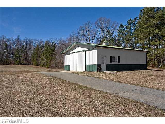 1031 Sutton Road Greensboro, NC 27406 - Photo 13 of 16 Stable/Barn. The barn is ready for you to set up. It offers water and power.