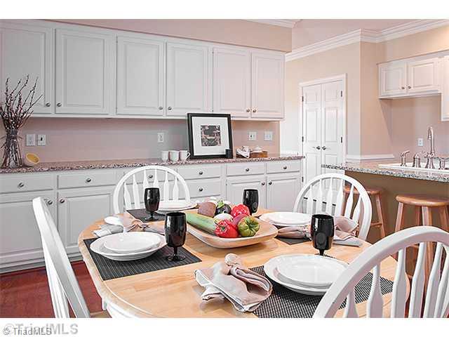 1031 Sutton Road Greensboro, NC 27406 - Photo 3 of 16 Kitchen. Spacious kitchen with eat in kitchen and fantastic counter space. What a wonderful home!