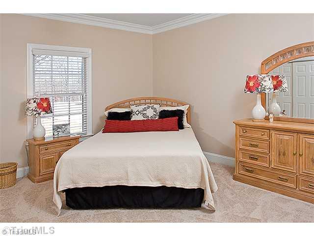 1031 Sutton Road Greensboro, NC 27406 - Photo 7 of 16 2nd Bedroom. Beautiful 2nd bedroom with private bathroom access, new carpet, new interior paint, beautiful molding and more.
