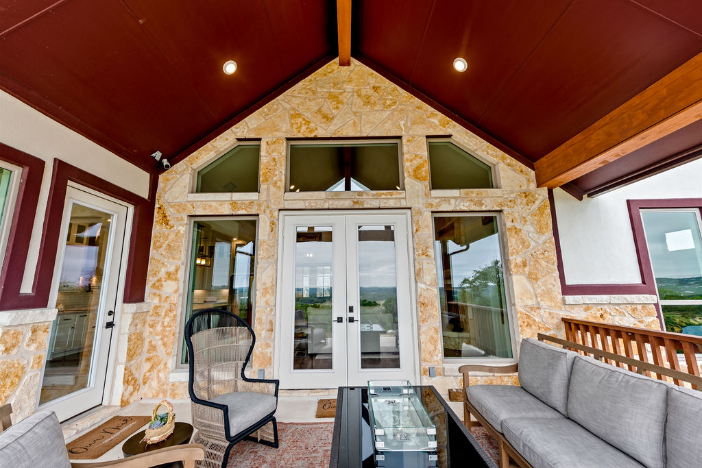 213 Lets Roll Drive Fischer, TX 78623 - Photo 32 of 38 View of patio featuring french doors and an outdoor living space
