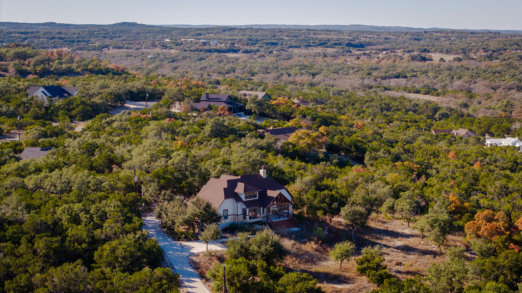 213 Lets Roll Drive Fischer, TX 78623 - Photo 36 of 38 an aerial view of a house with a outdoor space