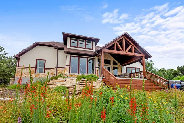 a outdoor space with patio the couches and a dining table with the view of the balcony
