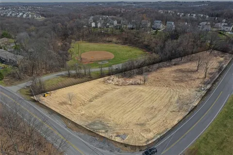 a view of swimming pool from a balcony