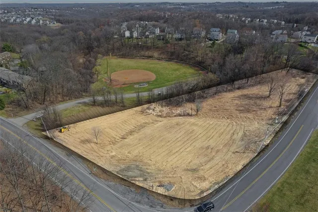 a view of swimming pool from a balcony
