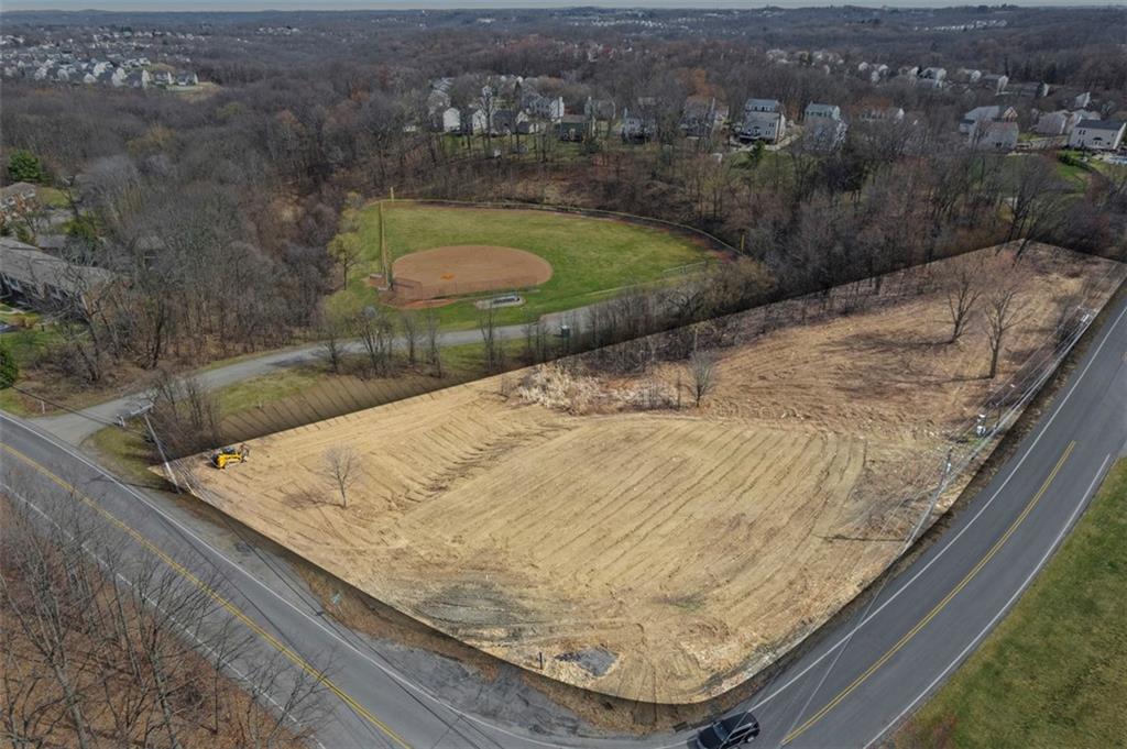 a view of swimming pool from a balcony