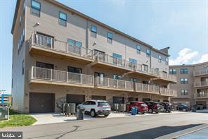 44782 Tiverton Square Ashburn, VA 20147 - Photo 15 of 26 a car parked in front of building