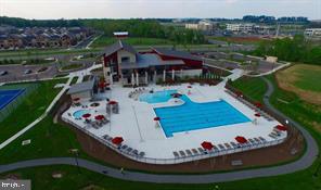 44782 Tiverton Square Ashburn, VA 20147 - Photo 19 of 26 an aerial view of a house with swimming pool having outdoor seating