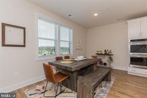 44782 Tiverton Square Ashburn, VA 20147 - Photo 7 of 26 a view of a dining room with furniture and window