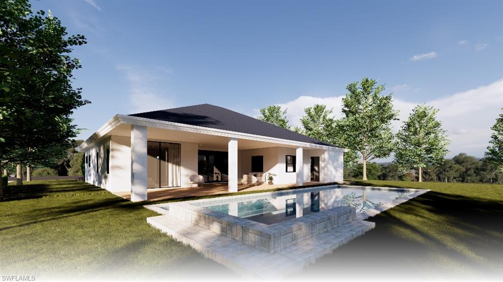 533 6th Street Southeast Naples, FL 34117 - Photo 4 of 9 a front view of a house with a yard