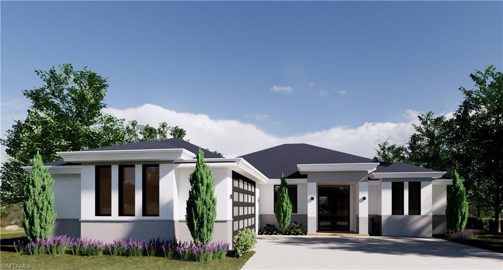 533 6th Street Southeast Naples, FL 34117 - Photo 7 of 9 a front view of a house with garden