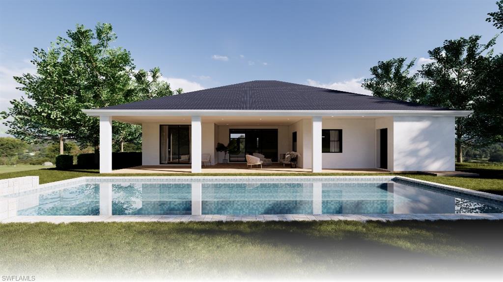 533 6th Street Southeast Naples, FL 34117 - Photo 8 of 9 front view of a house with a yard