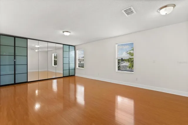 a bathroom with a granite countertop sink mirror and a