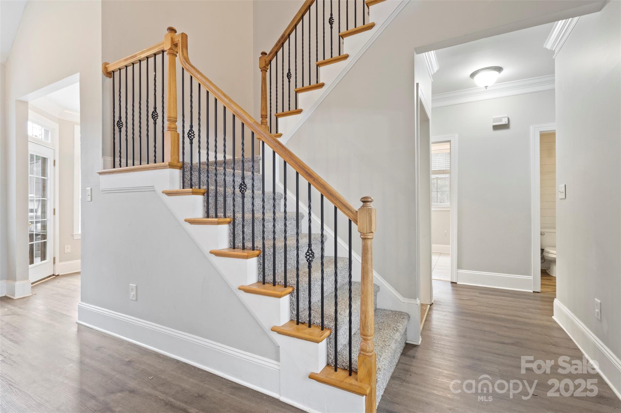 6655 Maple Spring Court Denver, NC 28037 - Photo 20 of 48 a view of entryway and hall with wooden floor
