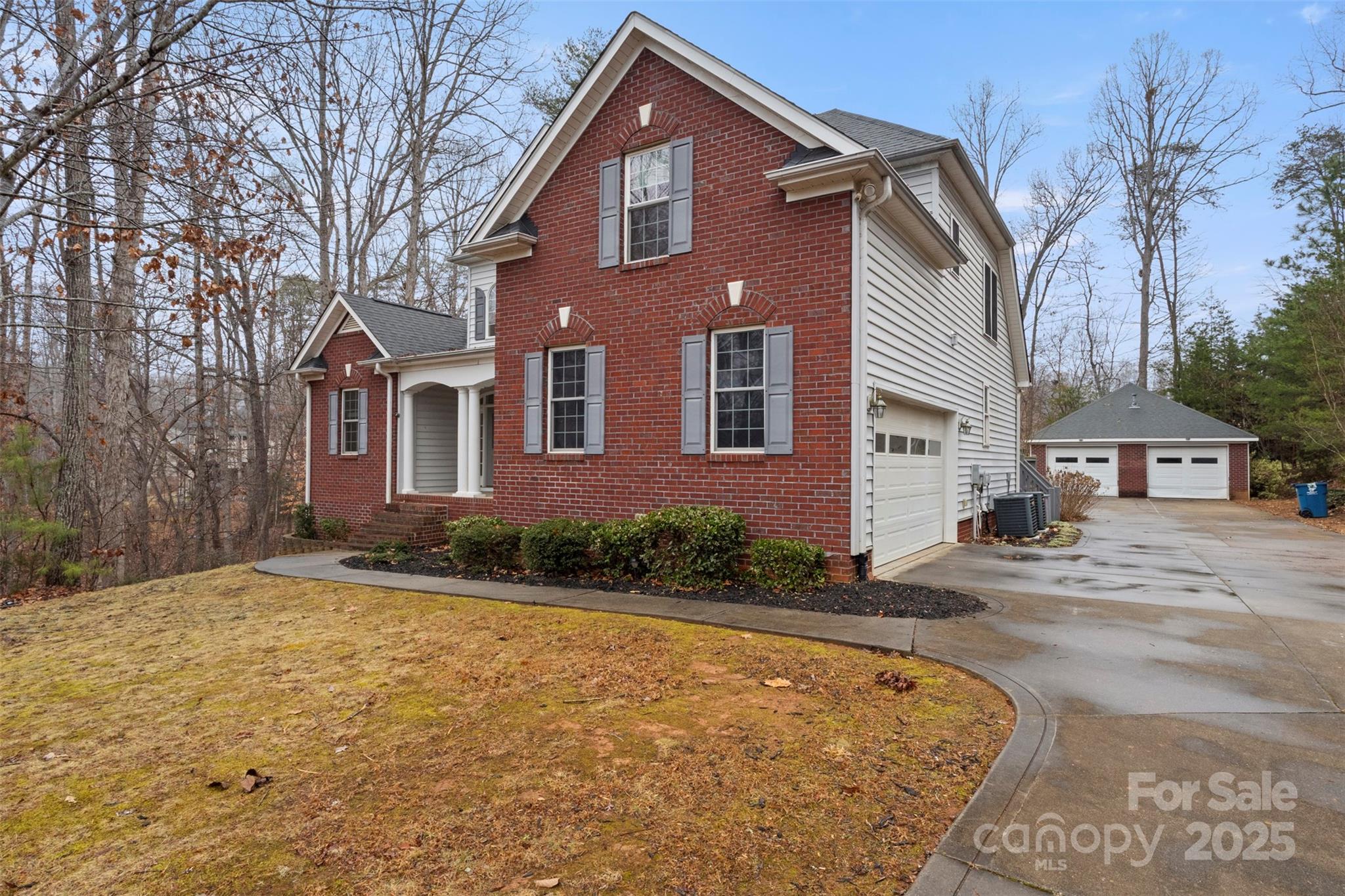 6655 Maple Spring Court Denver, NC 28037 - Photo 3 of 48 a front view of a house with a yard