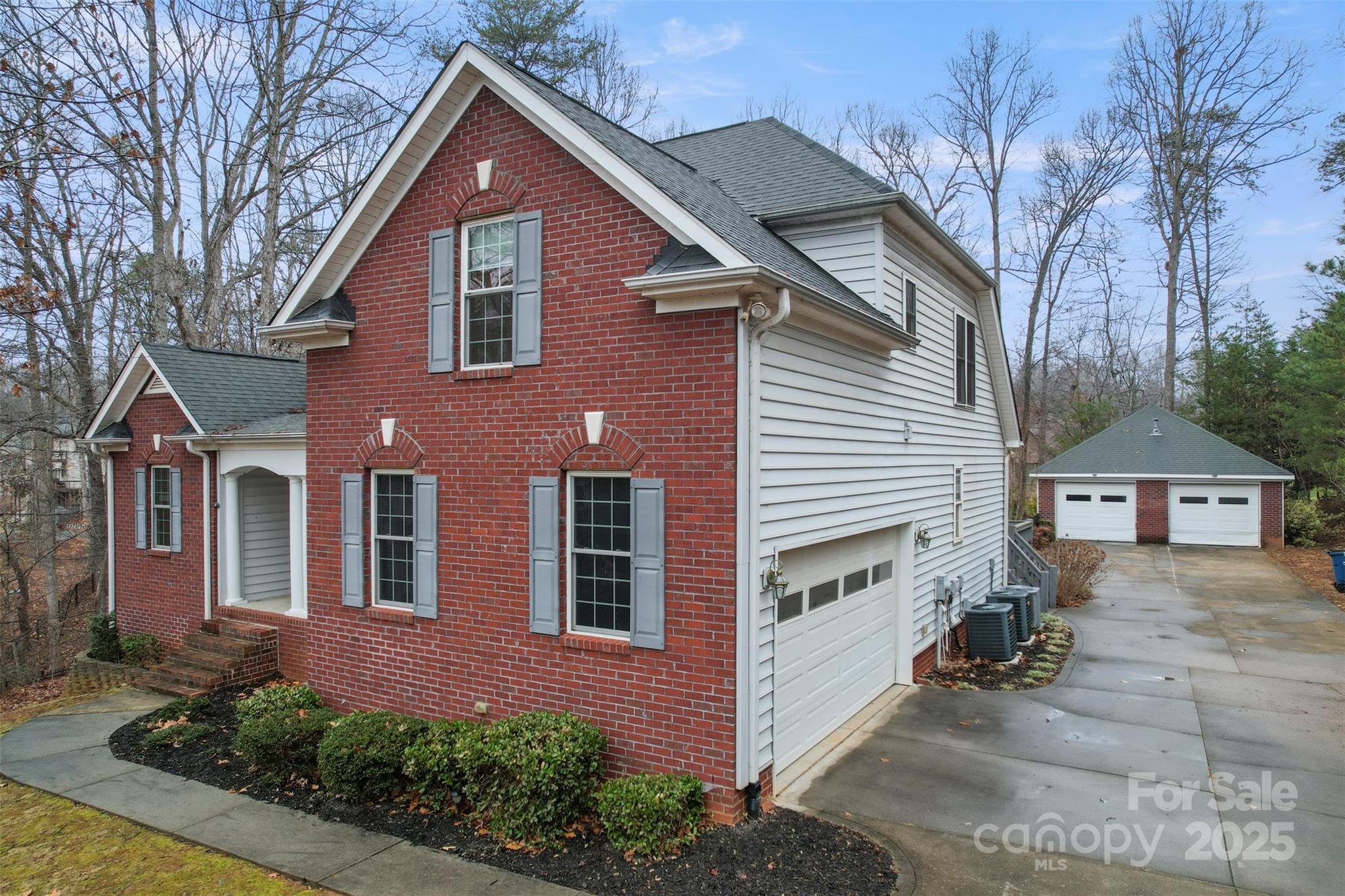 6655 Maple Spring Court Denver, NC 28037 - Photo 4 of 48 a front view of a house with a yard