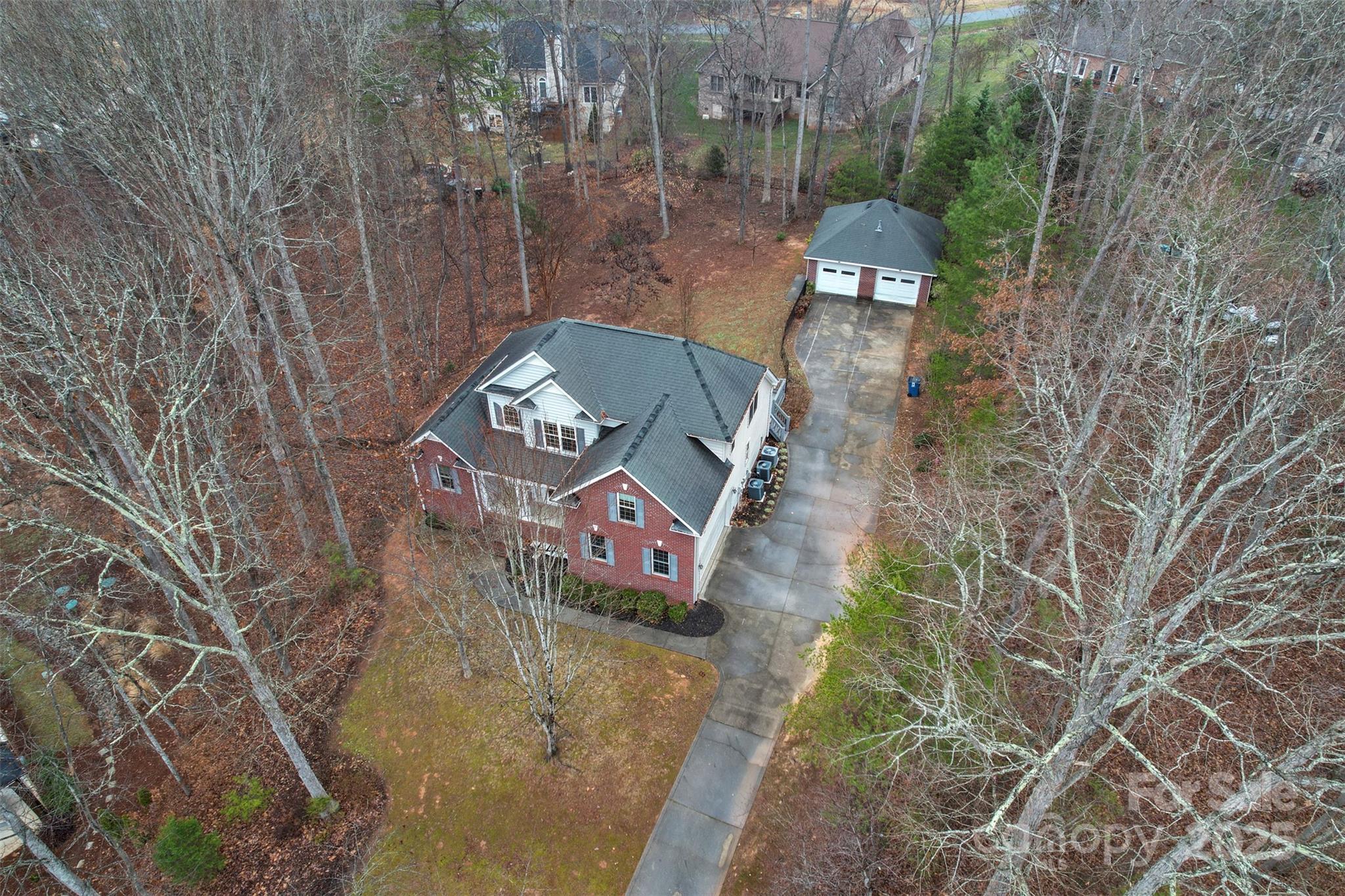 6655 Maple Spring Court Denver, NC 28037 - Photo 41 of 48 a front view of a house with a yard