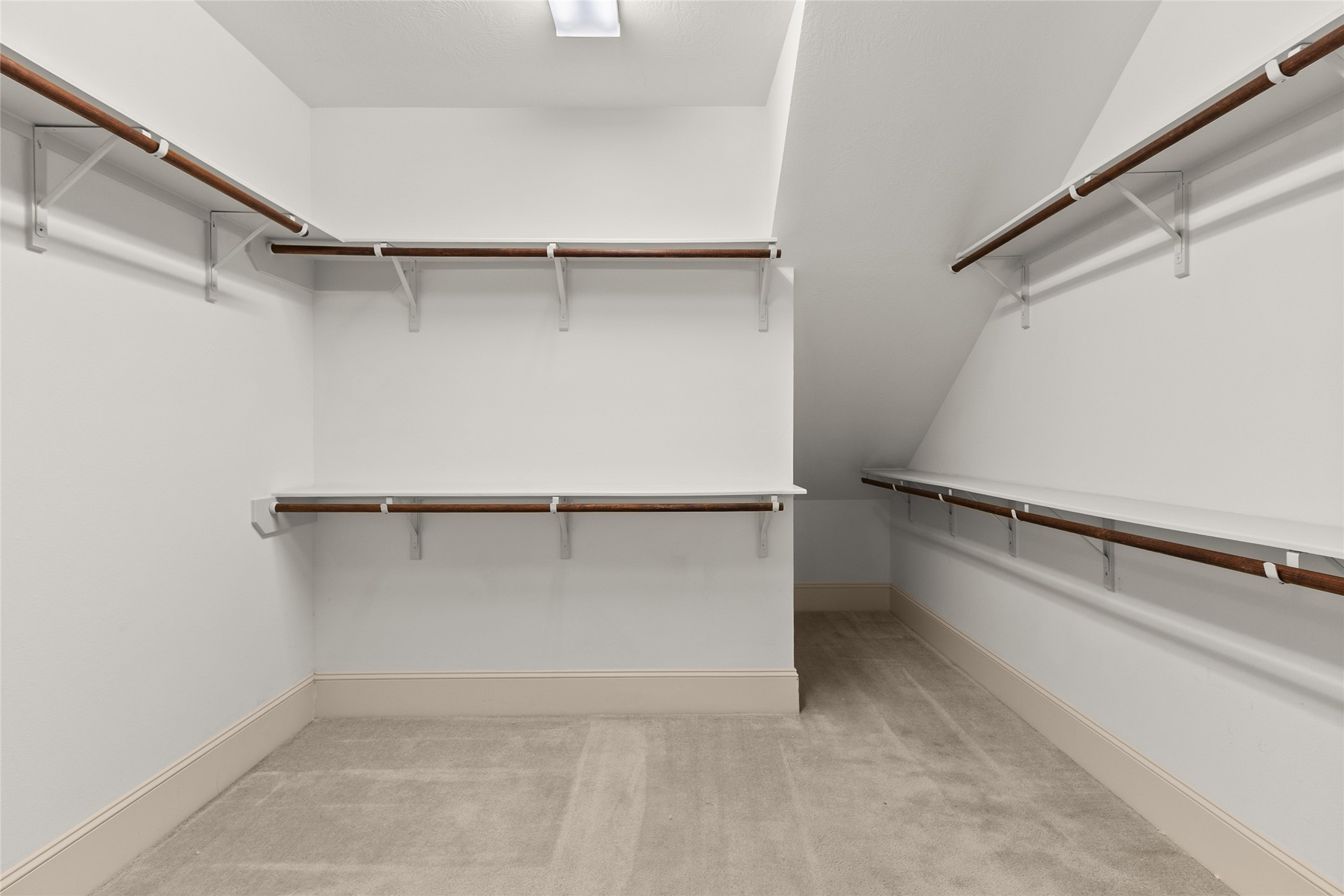 3302 Rochdale Street Houston, TX 77025 - Photo 29 of 50 Generous walk-in closet provides extensive shelving and hanging space on multiple walls.