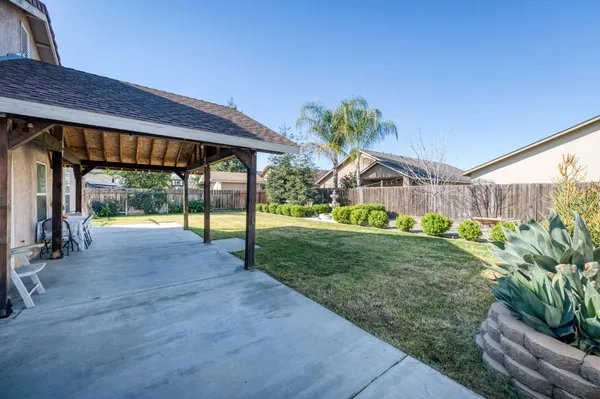 a house view with a garden space
