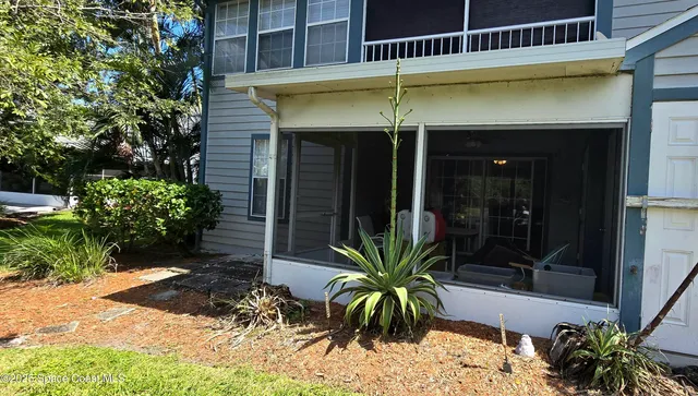 a bathroom with a shower a toilet and a sink